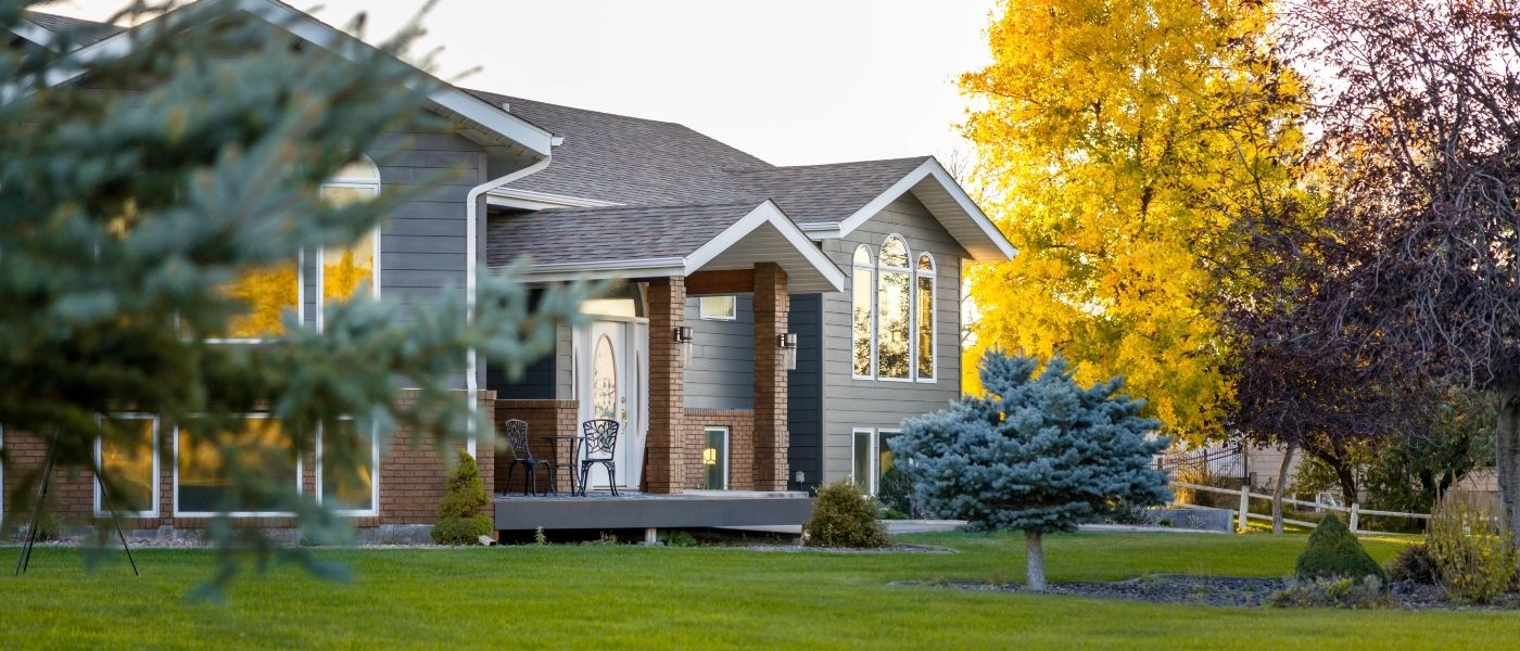 Picture of beautiful house with a large front lawn